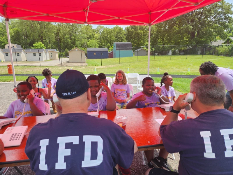 a group of coaches with their students